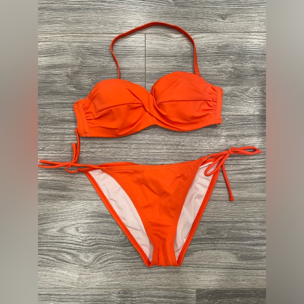 Never worn Victoria Secret Orange bandeau top and matching bikini bottom